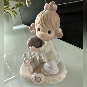 Precious Moments collectable figurine number 10.